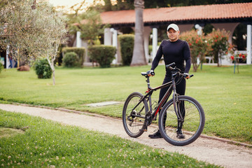 Man Cycling in Park