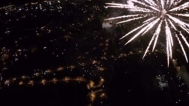 Aerial of a feast in a city with fireworks