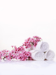 Tropical Spa with blooming branch with towel 
