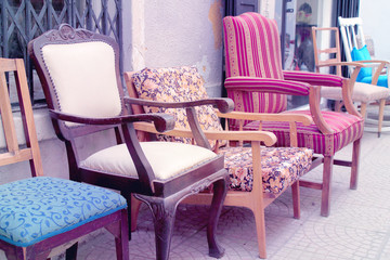Antique soft armchairs in different colors