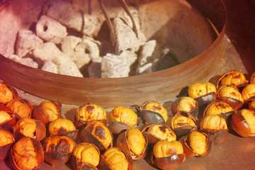 Cooking roasted charcoal chestnuts on street