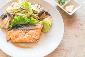 fried salmon steak with vegetable