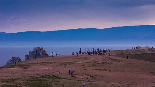 4K time-lapse of tourists traffic near Shamanka Rock. Burhan, Olkhon Island, Lake Baikal, Russia. Beauty of Siberian nature.
