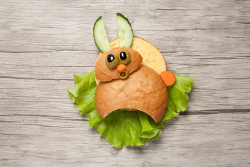 Scared sandwich rabbit created on wooden table