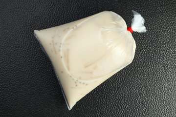 The soy milk in food grade plastic bag.