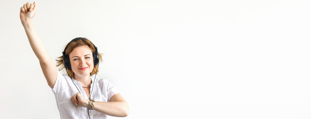 Beautiful girl in headphones, soft focus