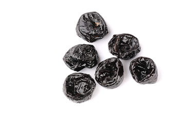Prunes isolated on white background