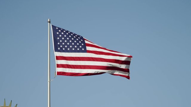 American flag against a beautiful blue sky