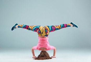 The teen girl dancing hip hop choreography