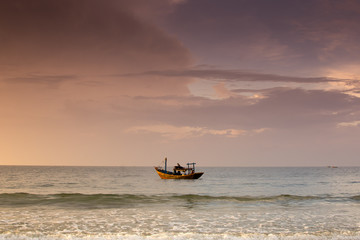 Floating fishing boat in the sea