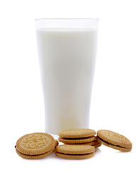 Glass of milk and cookies isolated on white background