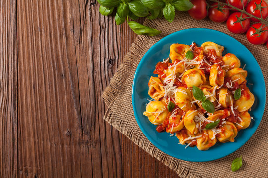 Delicious tortellini with meat in tomato sauce.