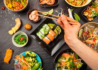 Asian food table with various kind of chinese food