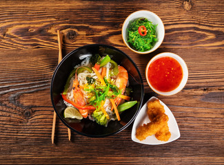 Asian prawns with rice noodles and spring rools
