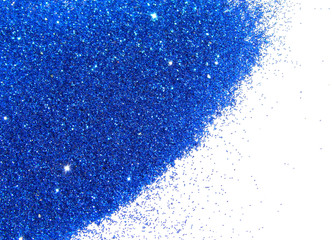 Blue glitter sparkles on white background. Can be used as place for text, for greeting or invitation cards, fashion magazines, web sites etc.