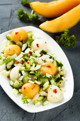 Melon salad with celery, chili and cucumber