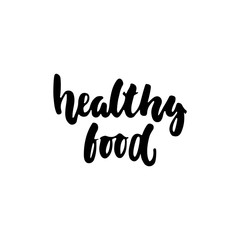 Healthy food - hand drawn lettering phrase isolated on the white background. Fun brush ink inscription for photo overlays, greeting card or t-shirt print, poster design.