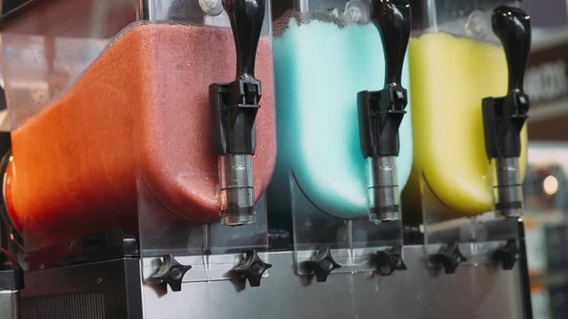 Different types of slush ice drinks. Capacity with  slush drinks. Close-up.
