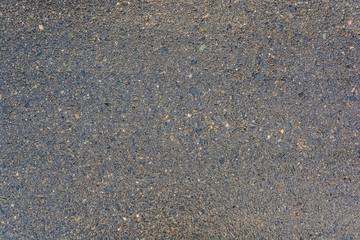 Close up of wet asphalt road texture