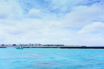Boats from hotel coming to pick up tourists at Maldives Ports , Maldives Island