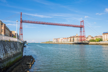 The Vizcaya Bridge is a transporter bridge that links the towns of Portugalete and Las Arenas close...