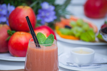 Healthy red smoothie and ingredients - superfoods, detox, diet, health, vegetarian food concept.