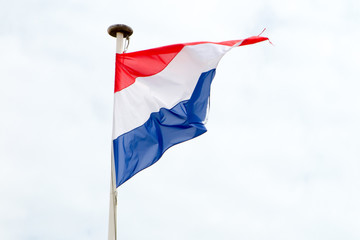 flag of the Netherlands floats in the sky