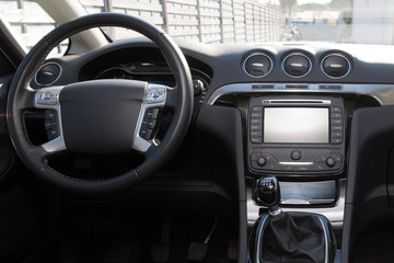 dashboard of a recent car with a tablet inside
