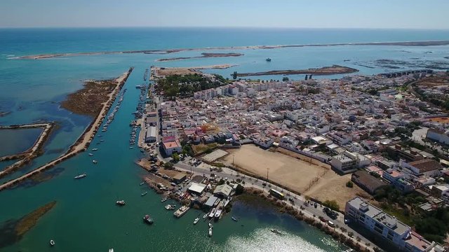 Aerial. Fishing village of Fuseta, and views of the Gulf Sea.