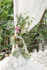 Modern european traditional wedding ceremony. Beautiful floral decoration closeup.