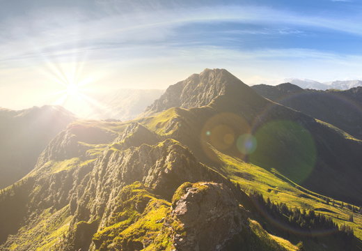 Fototapeta Sonnenaufgang mit Alpenpanorama