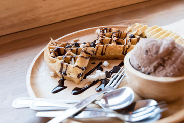 Belgian waffles with fruit and chocolate, forest fruit, all homemade, delicious batter