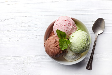 Bowl of various colorful ice cream balls