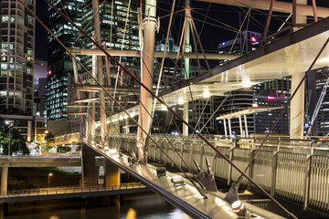 Kurilpa Bridge illuminated pedestrian architecture closeup looking towards Brisbane CBD 