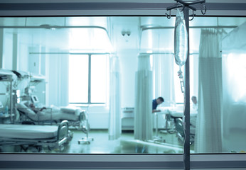 Intensive care unit ward behind the window glass