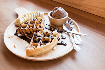 Belgian waffles with fruit and chocolate, forest fruit, all homemade, delicious batter