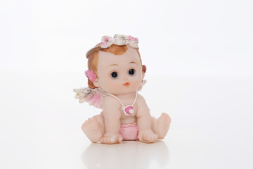 Statuetta a forma di angioletto con ciuccio