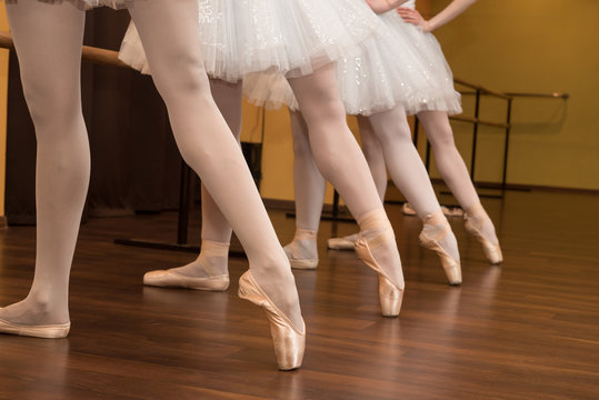 Ballerinas dancing in white costumes