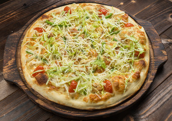 Caesar pizza on the board