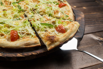 Caesar pizza on the board
