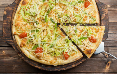 Caesar pizza on the board