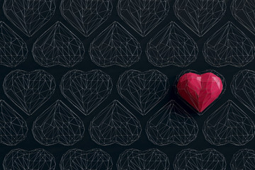 Unique red heart on black background among the many empty wireframe hearts. Abstract polygonal heart with shadow. Love symbol. Low-poly colorful style. 3d rendering