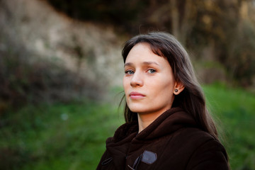 Beautiful brunette woman in the park