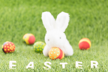 Bunny toys and Easter eggs with text