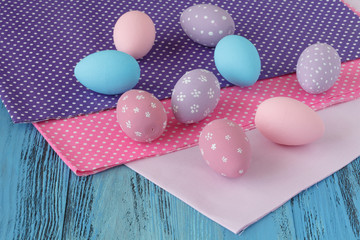 Easter celebration with colored eggs and festive cloth
