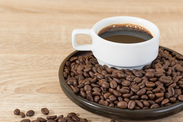 Coffee beans and coffee cup