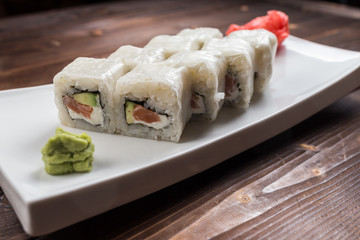 Maki rolls with smoked salmon with wasabi on back front