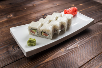 Maki rolls with smoked salmon with wasabi on back front