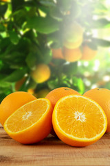 Fresh oranges fruit on wooden table.