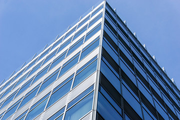 Fototapeta na wymiar View of a modern glass skyscraper buildings around